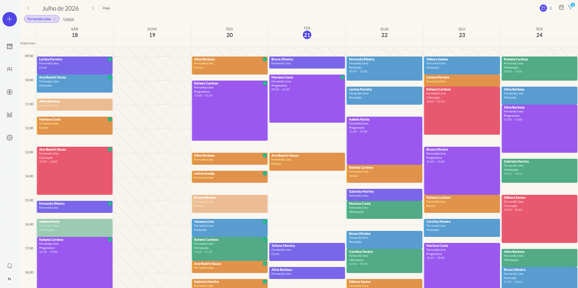Agenda do Marcou! no computador, com uma semana de agendamentos coloridos por profissional